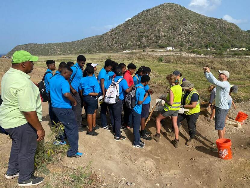 statian students at the archaeological site