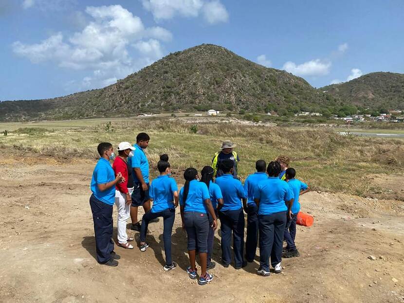 statian students at the archaeological site