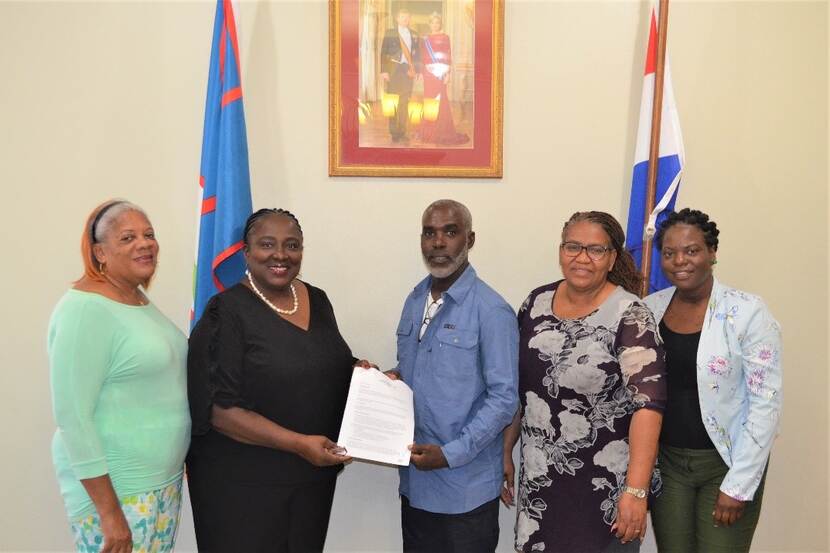 Photo from left to right: Ms. Ingrid Whitfield, coordinator infrastructure Social Domain, Ms. Alida Francis, Deputy Government Commissioner,  Mr. Carlyle Tearr of IBS,  Mrs. Carol Jack-Roosberg, Director Social Domain and Ms. Elizabeth Jones, Policy Advisor Social Domain.